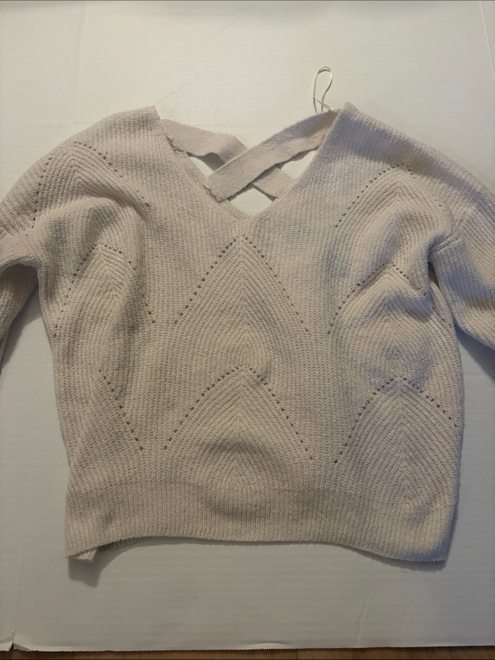 Women's Cream V‑Neck Knit Sweater with Back Strap Detail